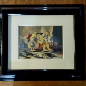 A Flintstone's Family Christmas Production Cel featuring Fred Flintstone and Stoney Flintstone
